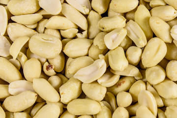 Texture of peeled roasted peanuts for the background