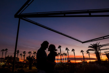 Fototapeta na wymiar couple in love at sunset of Tenerife