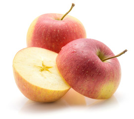 Apples (Evelina variety) isolated on white background one whole and one sliced.