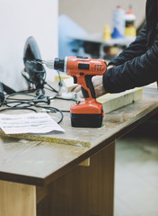 Senior craftsman working on woodwork