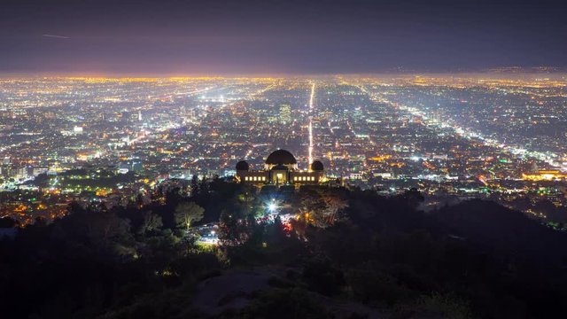 Los Angels skyline night Griffith Observatory city streets background Timelapse