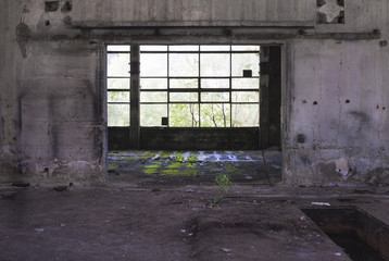 Fototapeta na wymiar Interior of an abandoned production hall in Romania