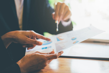 Administrator business man financial inspector and secretary making report  calculating balance. Internal Revenue Service checking document. Audit concept