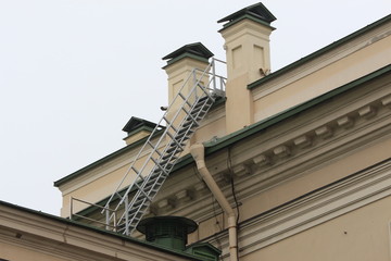 Fototapeta na wymiar stairway up on the roof