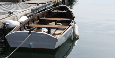 Wooden rowboat docked in Bar Harbor Maine