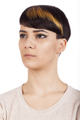Young woman wearing pixie short highlighted hairstyle