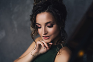 Portrait of aucasian woman with make up and curly hair in stylish scandinavian interiors, cozy atmosphere, pretty and beautiful close up portrait - Powered by Adobe