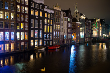Obraz premium River channel and houses in Amsterdam, Netherlands