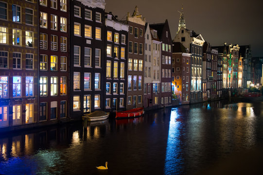 River channel and houses in Amsterdam, Netherlands
