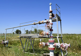 Well for oil and gas production. Oil well wellhead equipment. Oil production