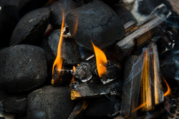 The hot charcoal and fire. Background.