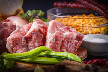 products for preparation of pea soup with smoked products: peeled peas, onions, pork, salt, spices