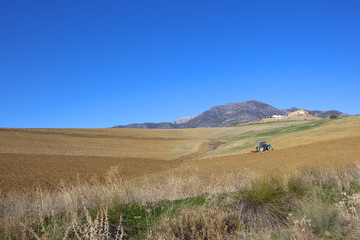 Obraz premium plowing soil