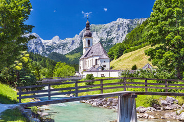 Scenic mountain landscape in the Bavarian Alps and famous Parish Church of St. Sebastian in the...