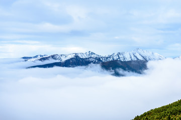 Fototapeta na wymiar misty morning view in wet mountain area in slovakian tatra