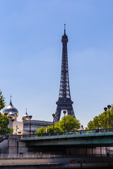 Fototapeta na wymiar Eiffel Tower. Holy Trinity Cathedral and The Russian Orthodox Spiritual. Pont de l'Alma. Paris