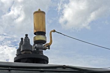 Close-up of whistle of old steam locomotive