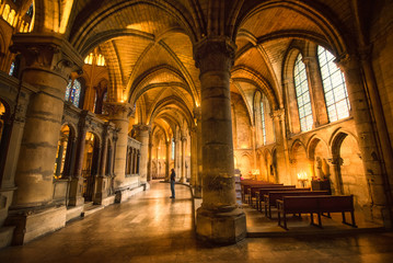 Fototapeta premium Long lightened corridor in Saint Remi abbey, Reims, France