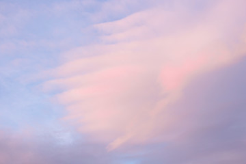 Naklejka na ściany i meble Blue sky with pink clouds