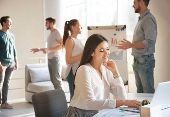 Young woman working in office