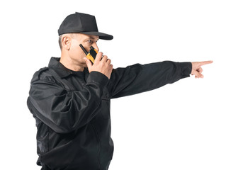 Male security guard using portable radio on white background