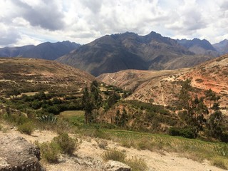 Fototapeta na wymiar View in pampa in Peru mountains with cloudy sky