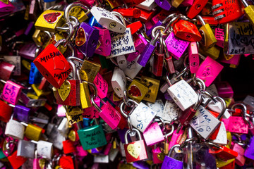 Many colourful love padlocks at the wall of Juliet's house, Verona,  Italy
