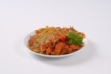 potato pancakes with spicy meat strips