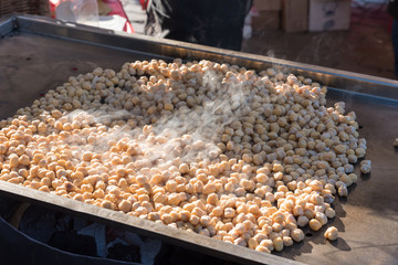 Hot grilled chickpeas. Street food