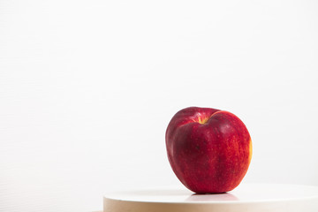 Apple on a table at white background 