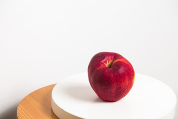 Apple on a table at white background 