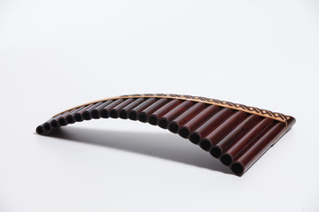Wooden Pan Flute Isolated on white 