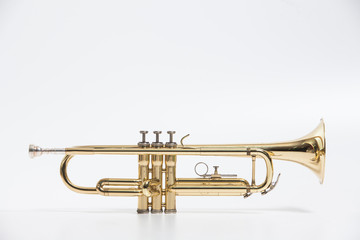 Naklejka na ściany i meble Gold lacquer trumpet with mouthpiece isolated on white