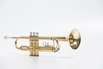 Fototapeta na wymiar Gold lacquer trumpet with mouthpiece isolated on white