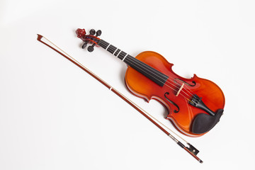 Fototapeta na wymiar Violin with bow isolated on white
