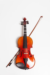 Naklejka na ściany i meble Violin with bow isolated on white