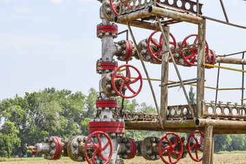 Well for oil and gas production. Oil well wellhead equipment. Oil production