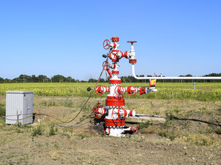 Well for oil and gas production. Oil well wellhead equipment. Oil production