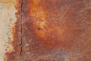surface of rusty iron with remnants of old paint, orange texture, background