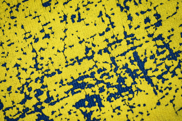 old cracked yellow color on textile