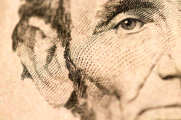 Closeup of Abraham Lincoln Face on Five Dollar Bill