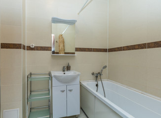 Small beige bathroom