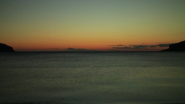 Scenic sunset over sea surface. Greece Peloponnese Lakonias Neo Itylo. Time lapse