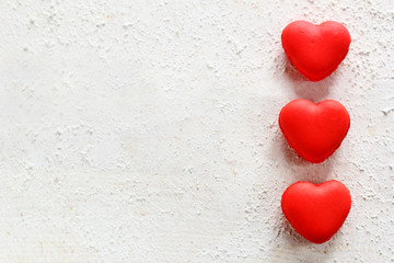 three macaroons on a white background