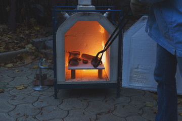 Heating stove for clay outside