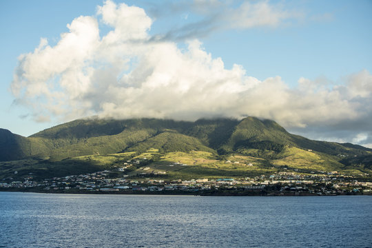 Basseterre, St Kitts and Mount Liamuiga draped in clouds at dawn.