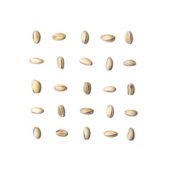 Roasted and salted pistachios isolated on white backround