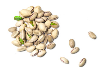 Roasted and salted pistachios isolated on white backround