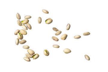 Roasted and salted pistachios isolated on white backround