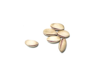 Roasted and salted pistachios isolated on white backround